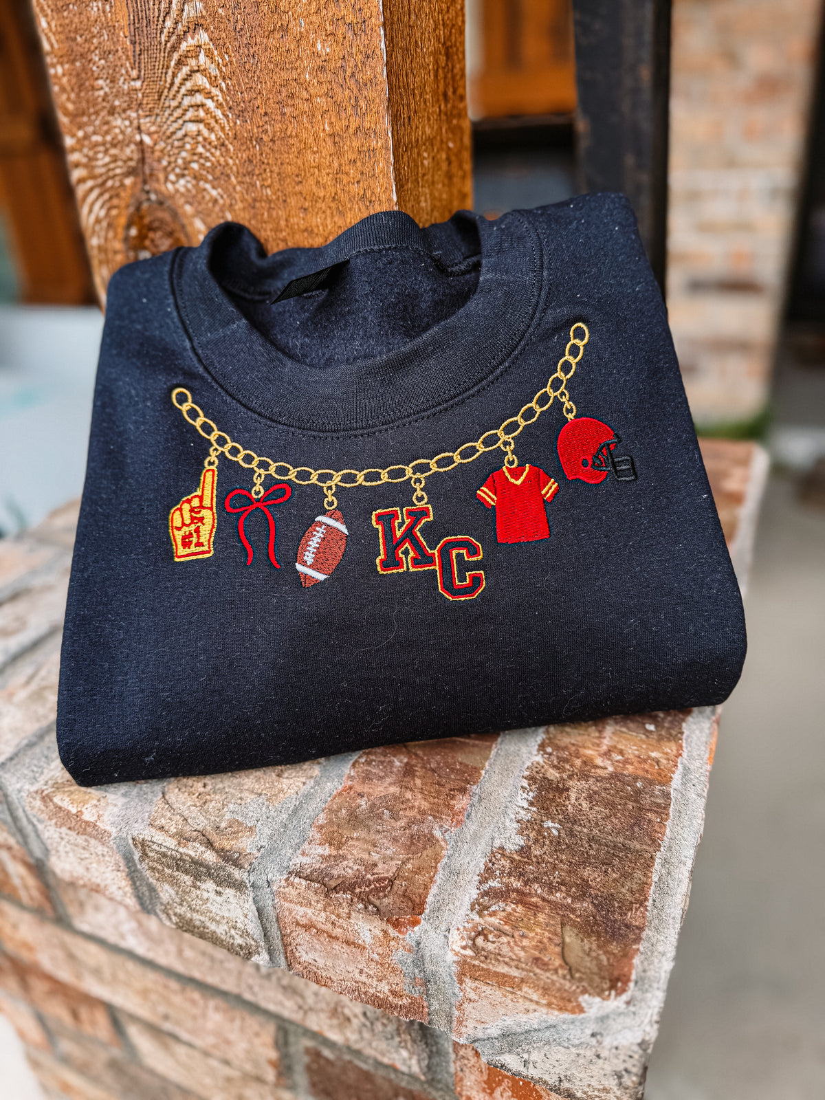 Black sweatshirt KC necklace
